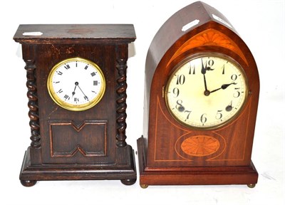 Lot 145 - An Edwardian inlaid mahogany mantel clock and an oak mantel clock