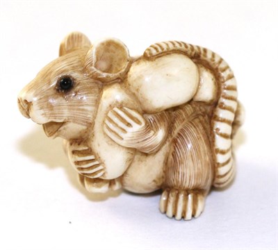 Lot 216 - A Japanese Ivory Netsuke, Meiji period, as a rat carrying a gourd on its back, signed, 2.5cm long