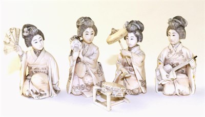 Lot 217 - A Set of Four Japanese Ivory Figures of Musicians, Meiji period, each as a kneeling Geisha in...