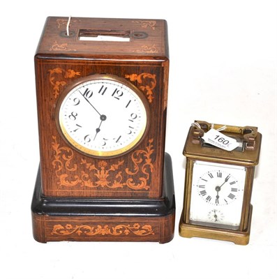 Lot 160 - A brass carriage clock engraved Jan 1914 and an inlaid rosewood clock (a.f.)