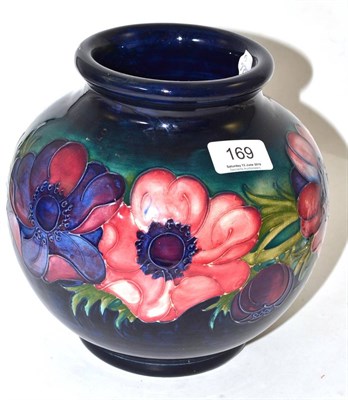 Lot 169 - A Walter Moorcroft Anemone pattern vase, with impressed factory marks, POTTER TO H.M THE QUEEN...