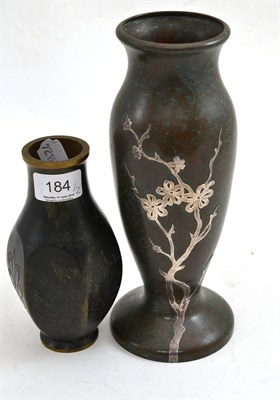 Lot 184 - A Danish Tinos bronze vase and an American vase with applied silver decoration