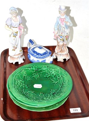 Lot 189 - Four green glazed plates, a pair of German figures and a Copeland Spode teapot