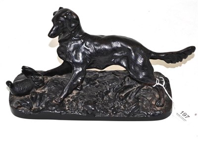 Lot 197 - Russian cast iron group of a hunting dog