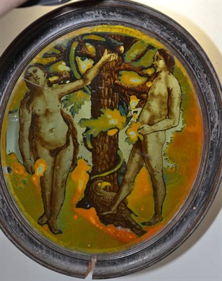 Lot 201 - A 17th/18th century stained glass window panel, painted with Adam & Eve in the tree of...