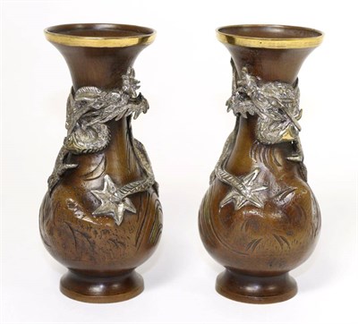 Lot 223 - A Pair of Japanese White Metal Mounted Bronze Vases, Meiji period, of baluster form with flared...