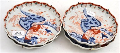 Lot 208 - Four Japanese Imari shaped circular dishes