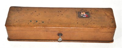 Lot 226 - An Art Nouveau leather glove box signed M Wurzl and Sohne, mounted with an enamelled plaque