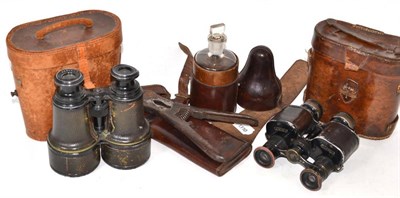 Lot 298 - A pair of WWI wire cutters in leather pouch, two pairs of field glasses, a leather bound bottle and