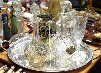 Lot 303 - Robert & Belk plated bottle holder, four decanters, plated tray and a Swedish glass vase