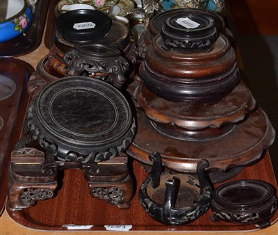 Lot 332 - A tray of Chinese carved wooden stands