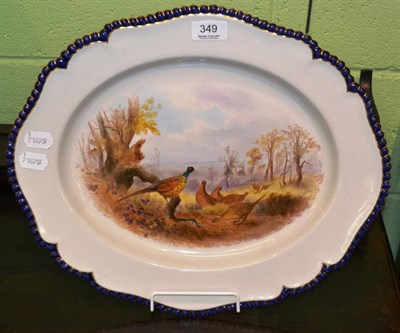 Lot 349 - A Royal Worcester meat plate, painted with pheasants, monogrammed 'CJ'