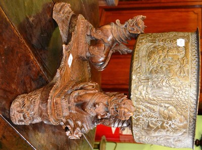 Lot 364 - Burmese brass planter on a carved stand