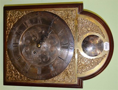 Lot 373 - An unusual wall mounted clock by Thomas Calvert, Stokesley, the face of a longcase clock on...