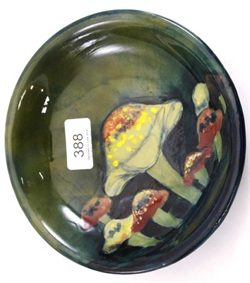 Lot 388 - A William Moorcroft Claremont pattern dish (restored)