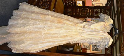 Lot 1031 - Wedding dress and train by Ronato Joyce of London