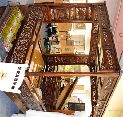 Lot 1032 - 19th century Chinese bed with fret carved panels