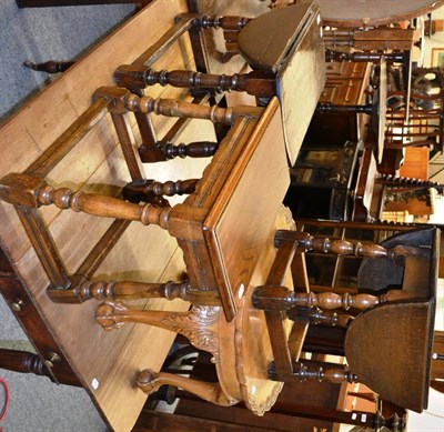 Lot 1036 - Two oak occasional tables with swivel tops, and an occasional table