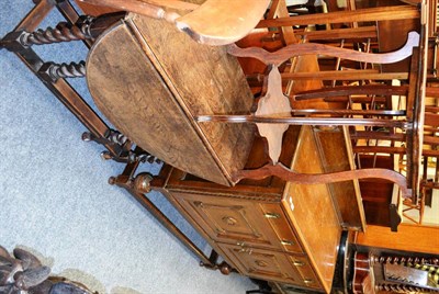 Lot 1055 - An early 20th century oak sideboard, an oak gateleg table and a side table