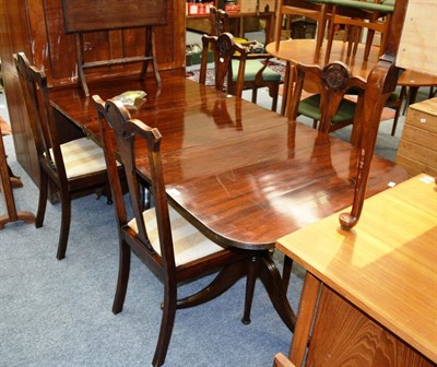 Lot 1063 - A dining table, a dressing table and four dining chairs