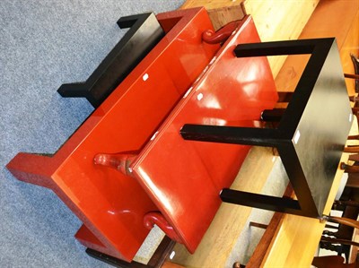 Lot 1069 - A 20th century cinnabar lacquered low rectangular coffee table, on four square section legs,...