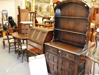 Lot 1074 - A quantity of furniture comprising dresser, bureau, table and chairs, magazine rack, further...