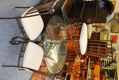 Lot 1075 - A glass topped dining table and four chairs