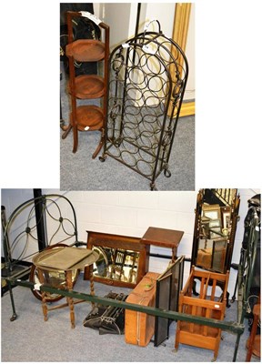 Lot 1085 - A wrought iron single bed frame, a cake stand and a wine rack