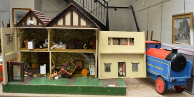 Lot 1096 - A doll's house and a wooden train