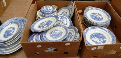 Lot 1105 - Assorted blue and white Willow pottery dinner and tea wares (in three boxes)