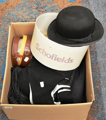 Lot 1120 - A bowler hat, leather box of collars, four waistcoats, two pairs of trousers and two tail coats