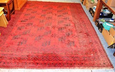 Lot 1135 - Turkmen carpet, North West Afghanistan, the field with three rows of elephant foot guls enclosed by