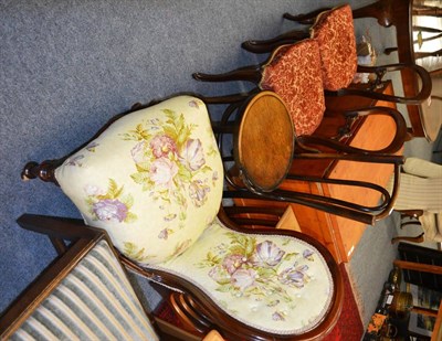 Lot 1141 - A nursing chair and three others