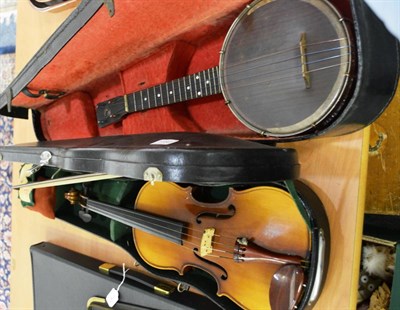 Lot 1180 - A 1930's ukulele and a Chinese violin