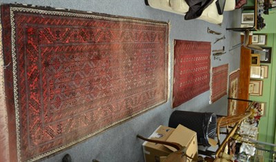 Lot 1281 - Turkmen rug, North West Afghanistan, the burgundy field with three rows of quartered guls...