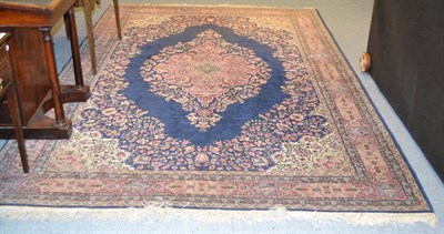 Lot 1286 - Kayseri carpet, Central Anatolia, the indigo field with a coral pink medallion framed by...