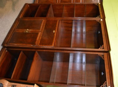 Lot 1303 - A mahogany display cabinet/bookcase with central storage area