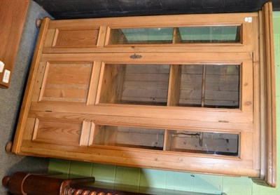 Lot 1307 - A pine display cabinet