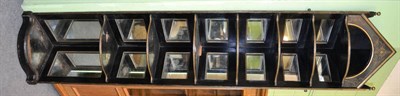 Lot 1308 - A pair of tall 19th century ebonised corner display shelves, with incised gilt decoration, each...