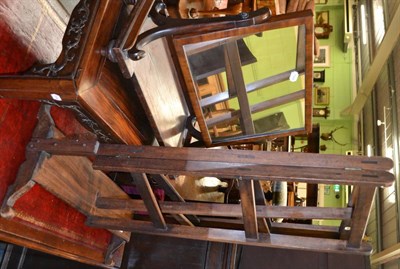 Lot 1321 - A mahogany towel rack and a mahogany toilet mirror