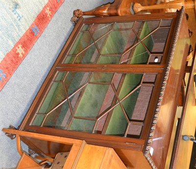 Lot 1327 - A mahogany bookcase with astragal glazed tablet doors