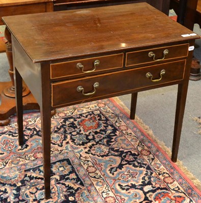 Lot 1334 - A George III side table with drawers