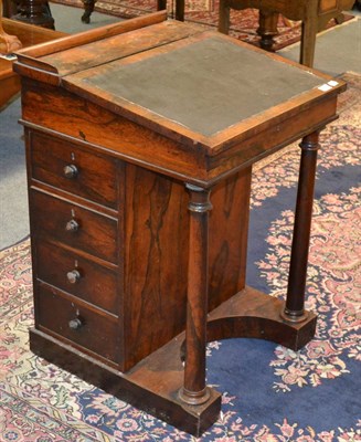 Lot 1335 - A George IV rosewood davenport