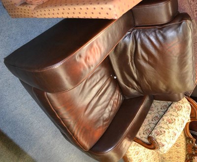 Lot 1362 - A single Natuzzi leather armchair