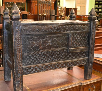 Lot 1368 - An Indian carved wooden food chest