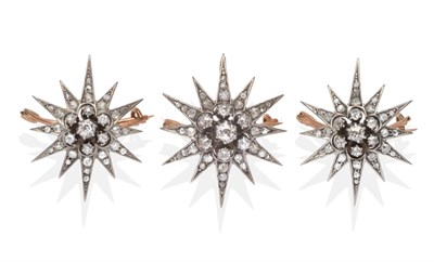 Lot 294 - A Set of Three Graduated Victorian Diamond Set Star Brooches,  each with a central old cut...