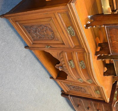 Lot 1397 - A late Victorian oak mirror back sideboard with carved panels