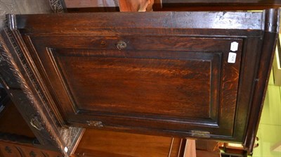 Lot 1404 - An oak wall hanging corner cupboard