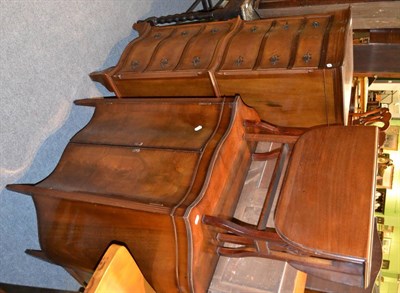 Lot 1405 - A reproduction serpentine fronted chest on chest of small proportions, a side cabinet and a table