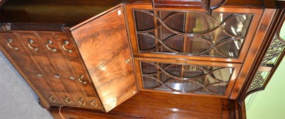 Lot 1408 - A George III mahogany bureau bookcase with astragal glazed cabinet top on ogee bracket feet